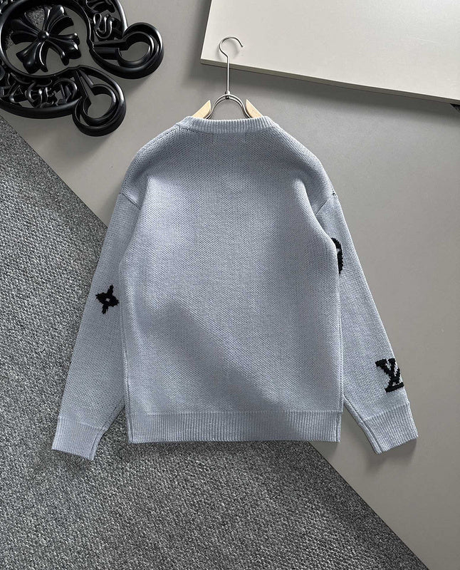 Close-up detail shot of Louis Vuitton luxury clothing with signature branding