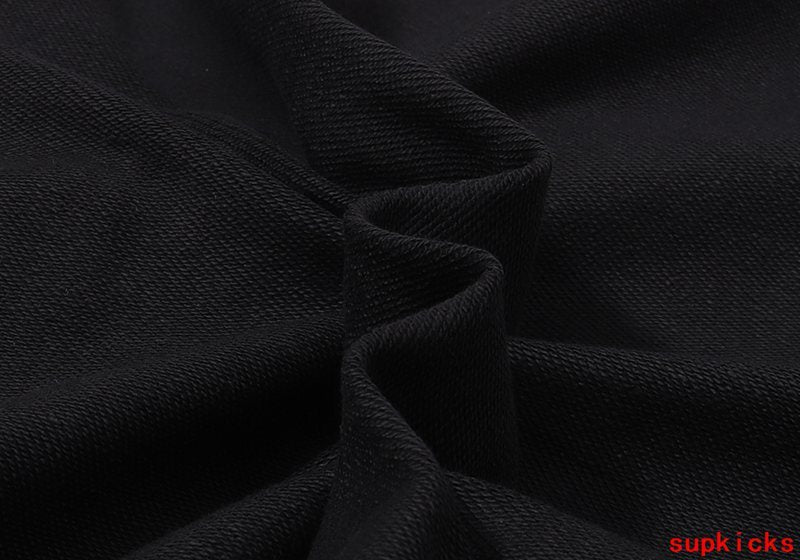 Side profile of Rhude luxury clothing with everyday silhouette