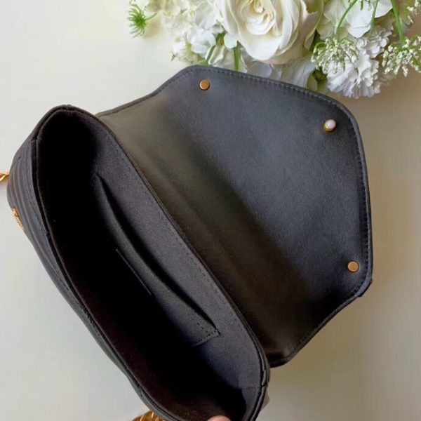 Back view of signature chic women's handbag – women's luxury accessory