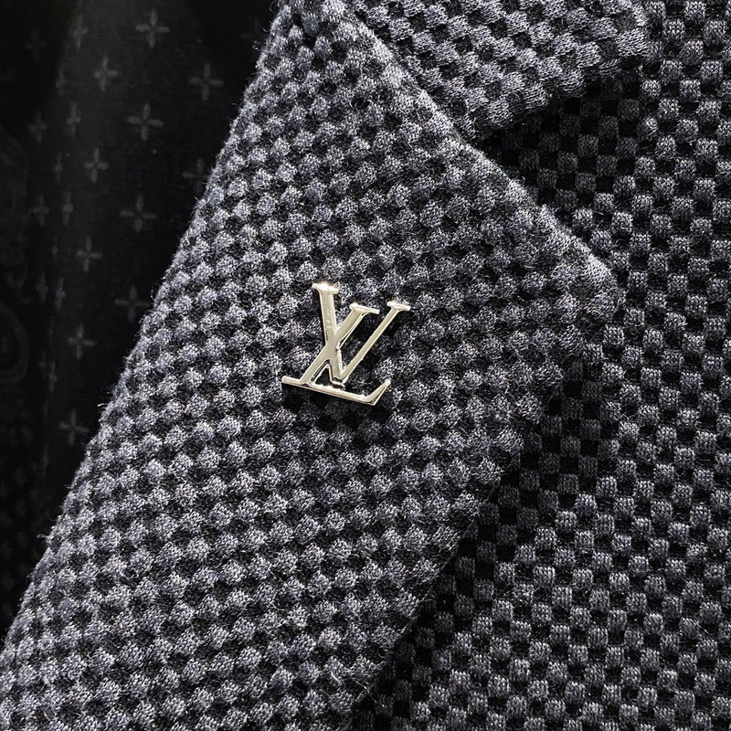 Flat lay presentation of Louis Vuitton luxury clothing with relaxed-fit cut