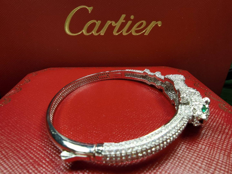 Close-up detail view of Cartier unisex jewelry piece