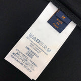 Flat lay presentation of Louis Vuitton cotton t-shirt with label-forward styling