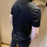 Back view of Moncler luxury clothing with tailored silhouette