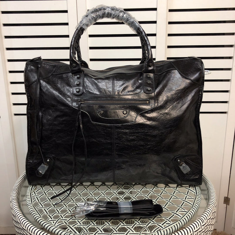 Front view of polished elevated women's handbag – women's statement bag