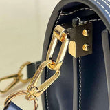 Styled lifestyle shot of chic statement women's handbag – women's luxury accessory