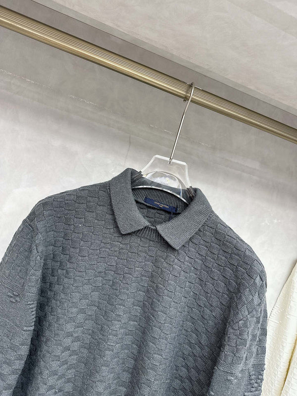 Flat lay presentation of Louis Vuitton luxury clothing with runway-inspired design
