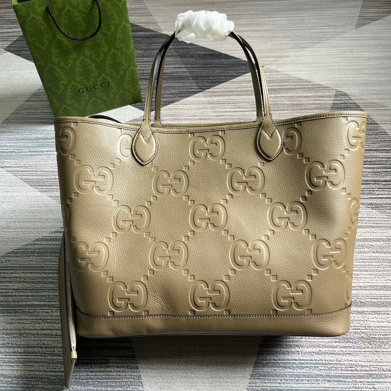 Side profile of signature elevated women's handbag – women's statement bag