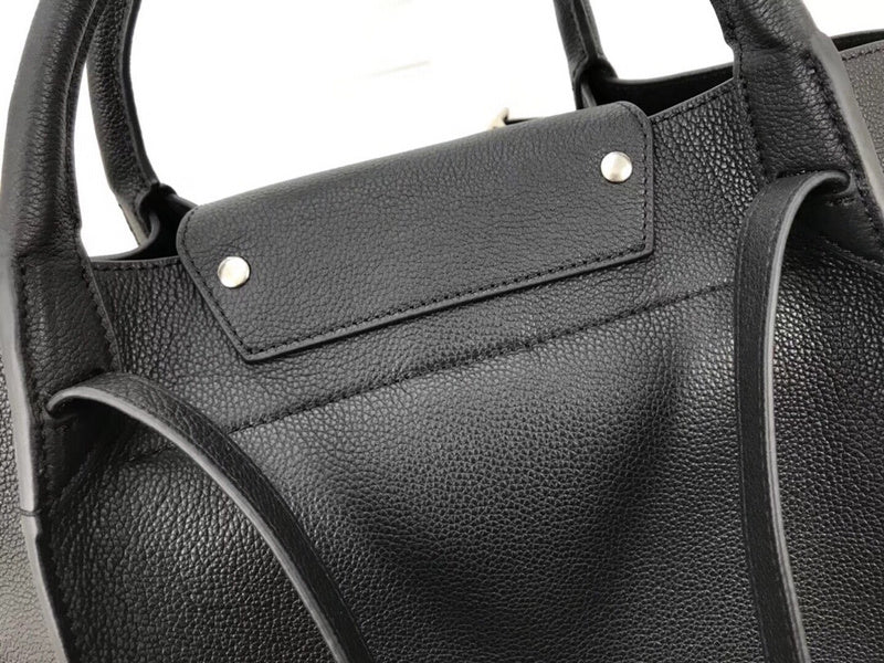 Back view of modern statement women's handbag – women's designer-style accessory