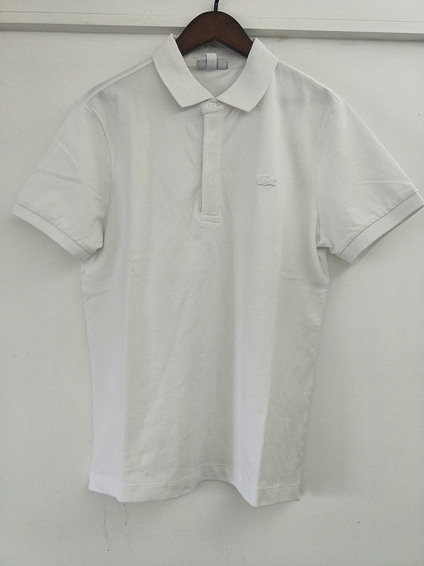 Back view of Lacoste luxury clothing with signature branding