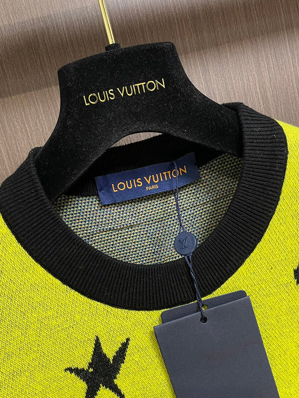 Close-up detail shot of Louis Vuitton luxury clothing with logo-detail design