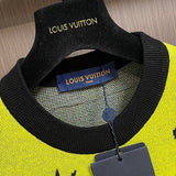 Close-up detail shot of Louis Vuitton luxury clothing with logo-detail design
