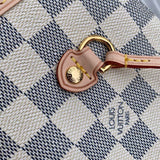 Side profile of structured polished women's handbag – women's everyday handbag