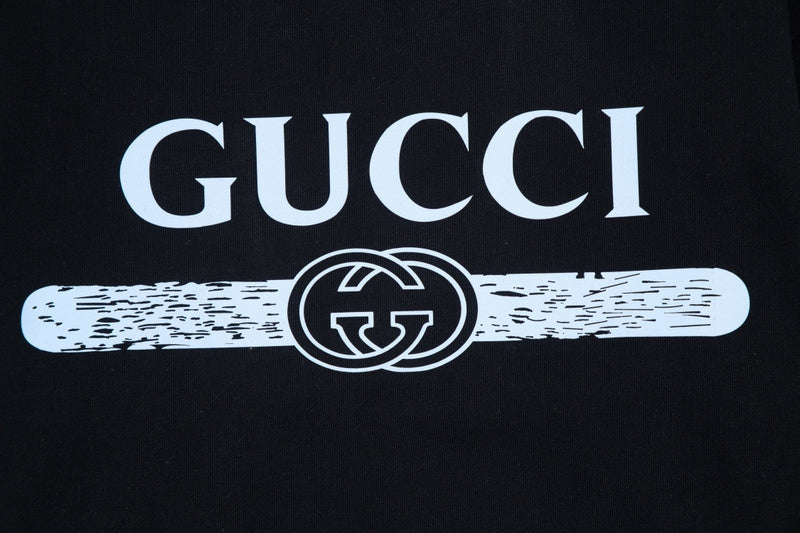 Flat lay presentation of Gucci luxury clothing with contemporary cut