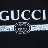 Flat lay presentation of Gucci luxury clothing with contemporary cut