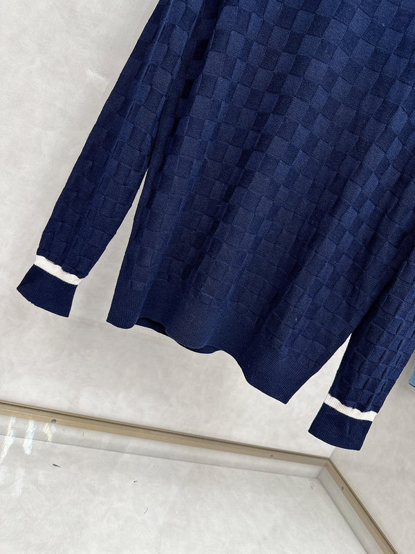 Back view of Louis Vuitton luxury clothing with signature branding