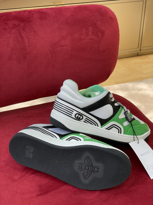 Side profile of Gucci fresh white-and-black sneakers streetwear statement look