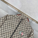 Side profile of Gucci luxury clothing with logo-detail design