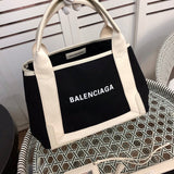 Front view of modern sleek women's handbag – women's designer-style accessory