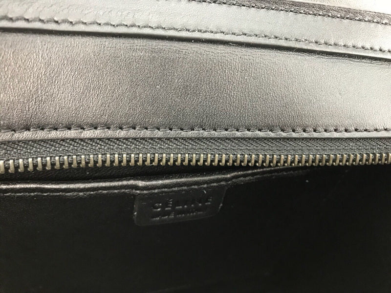Handle and strap detail of statement sleek women's handbag – women's designer-style accessory