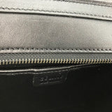 Handle and strap detail of statement sleek women's handbag – women's designer-style accessory