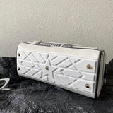 Handle and strap detail of signature everyday-luxe women's handbag – women's designer-style accessory