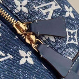 Handle and strap detail of signature structured women's handbag – women's statement bag
