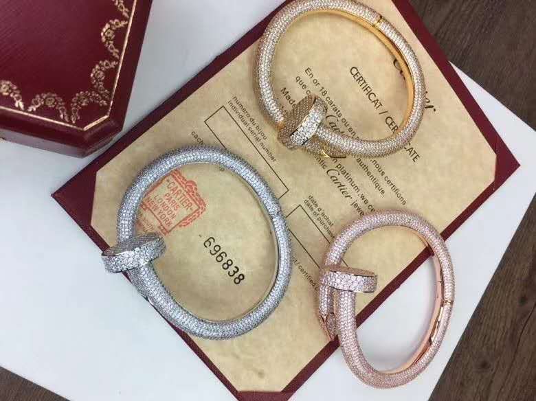 Side view of Cartier unisex jewelry piece