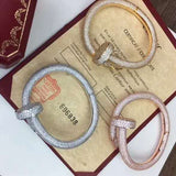 Side view of Cartier unisex jewelry piece