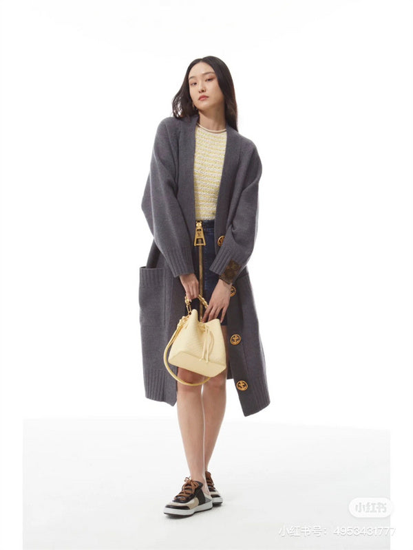  Signature handbag carried on shoulder