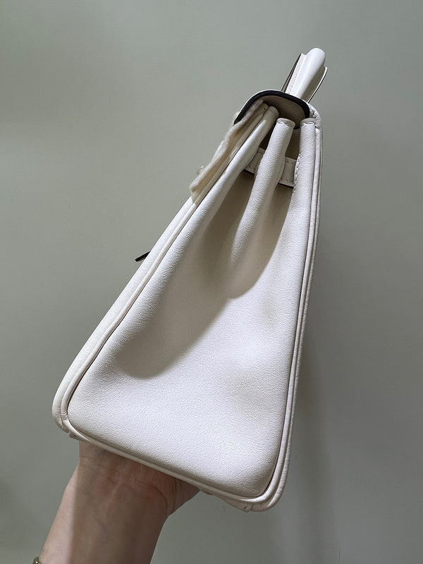 Side view of refined structured handbag