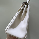 Side view of refined structured handbag