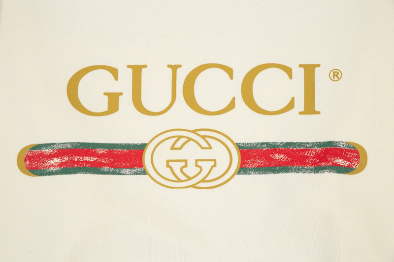 Flat lay presentation of Gucci luxury clothing with relaxed-fit cut