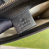 Side profile of sleek premium women's handbag – women's designer-style accessory