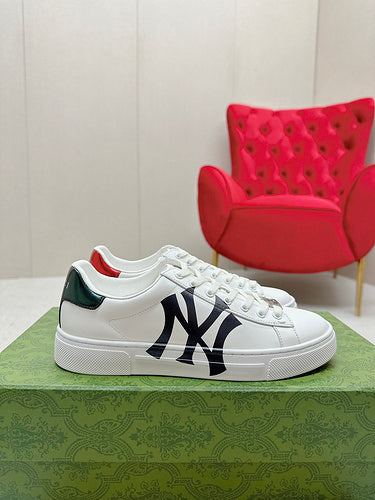 Gucci Designer sneakers in crisp white cushioned comfort fit front view