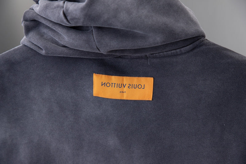 Side profile of Louis Vuitton luxury clothing with tailored silhouette