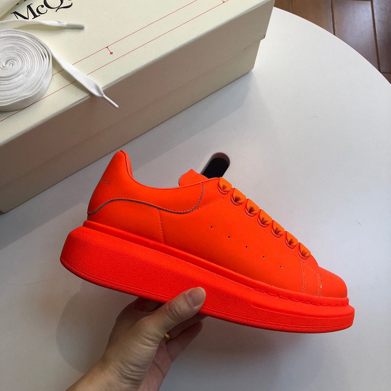 Alexander McQueen bold contrast luxury sneakers view 9 sleek tonal finish