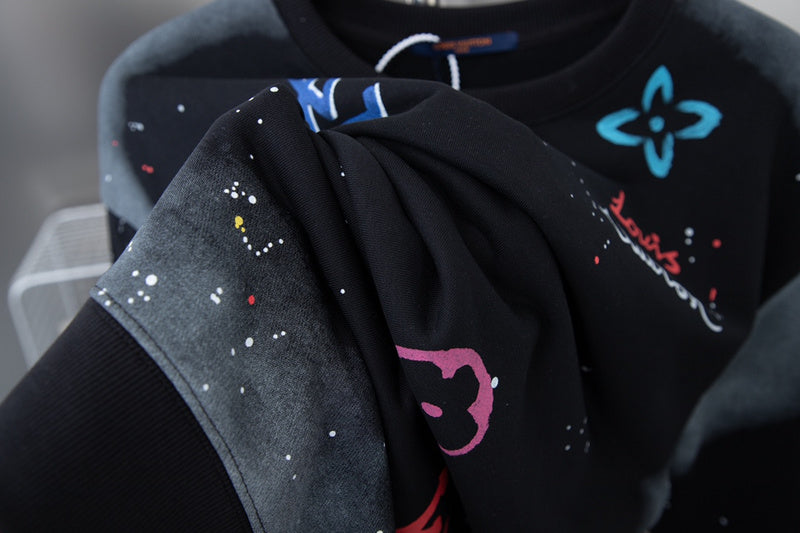 Flat lay presentation of Louis Vuitton luxury clothing with streetwear-inspired cut