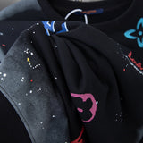 Flat lay presentation of Louis Vuitton luxury clothing with streetwear-inspired cut