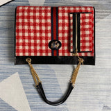 Top view of elevated polished women's handbag – women's designer-style accessory