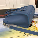 Styled lifestyle shot of refined sleek women's handbag – women's premium purse