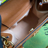Side profile of statement classic women's handbag – women's statement bag