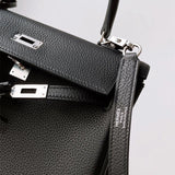  top-handle bag close-up of hardware and finish