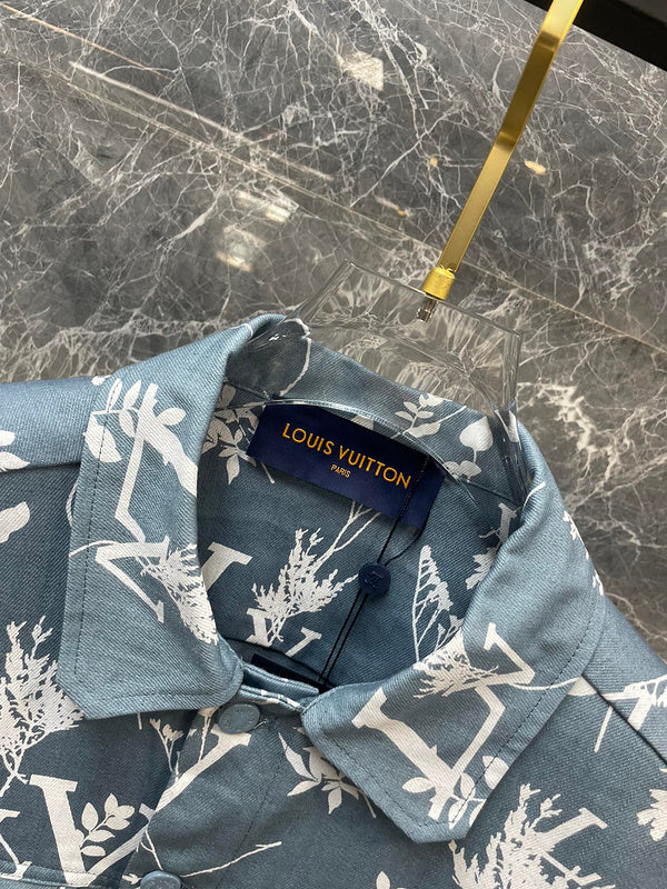 Close-up detail shot of Louis Vuitton luxury clothing with label-forward styling