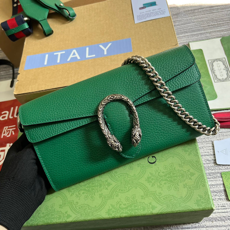 Handle and strap detail of polished structured women's handbag – women's designer-style accessory