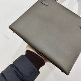 Side view of contemporary structured handbag