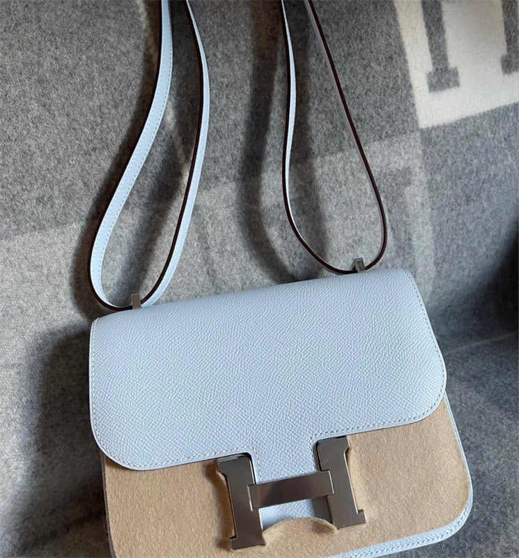 Side view of curated structured handbag