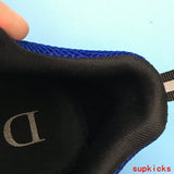 Dior Grey Low-Top Sneakers - Side Profile View