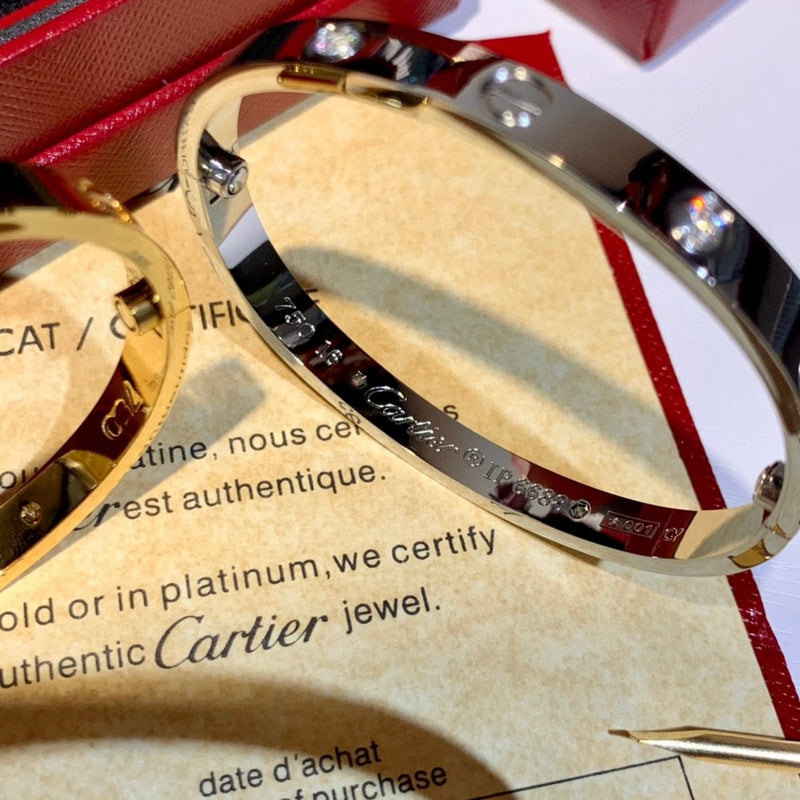 Side view of Cartier unisex jewelry piece