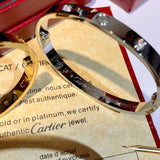 Side view of Cartier unisex jewelry piece