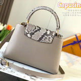 Styled lifestyle shot of sleek elevated women's handbag – women's luxury accessory